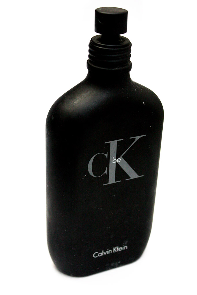 the black bottle has a silver dk logo on it