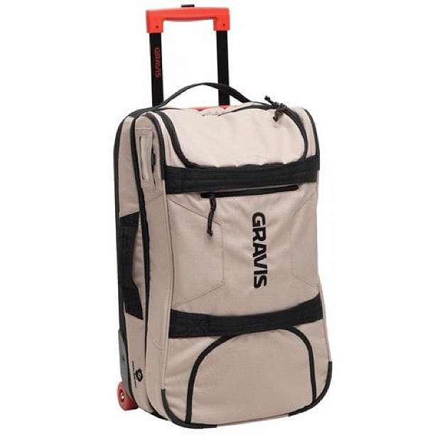 a canvas rolling bag with the logo of a large car on it