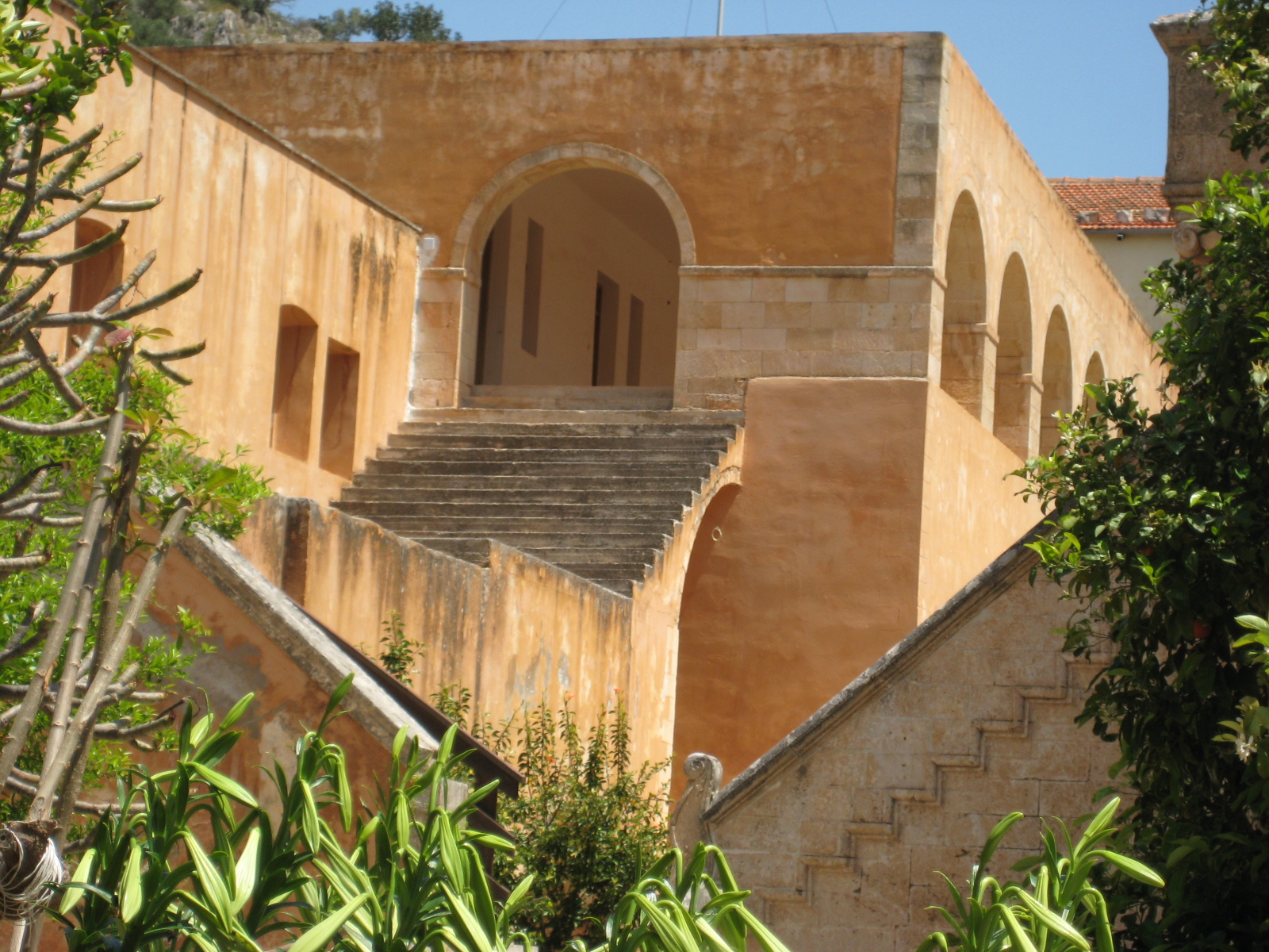 stairs leading to several arched arches and windows