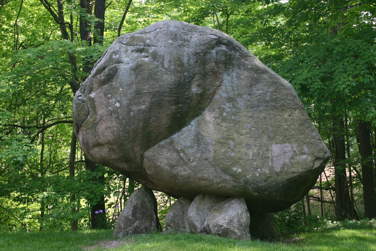 a huge rock with a very large face