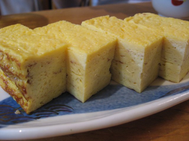 cake slices cut into four on a plate