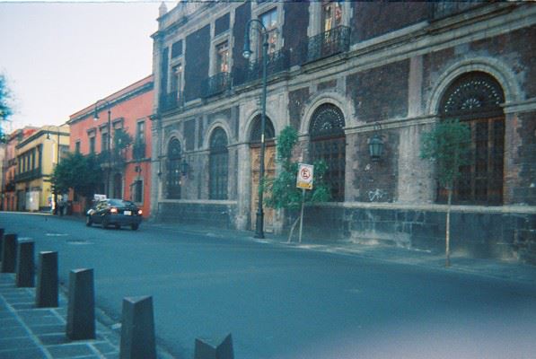 a very old looking building with several windows