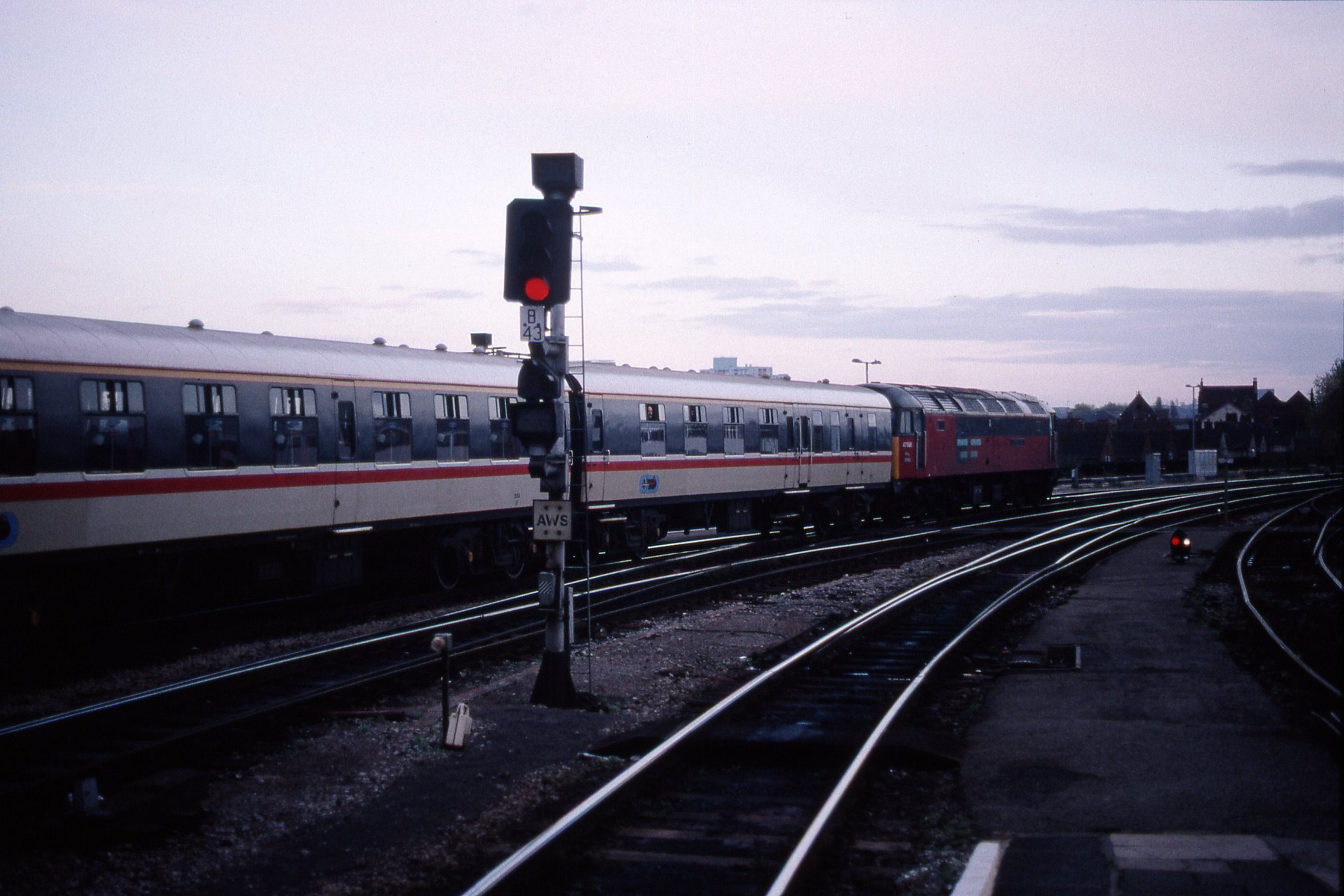 the railroad tracks are empty and are close to each other