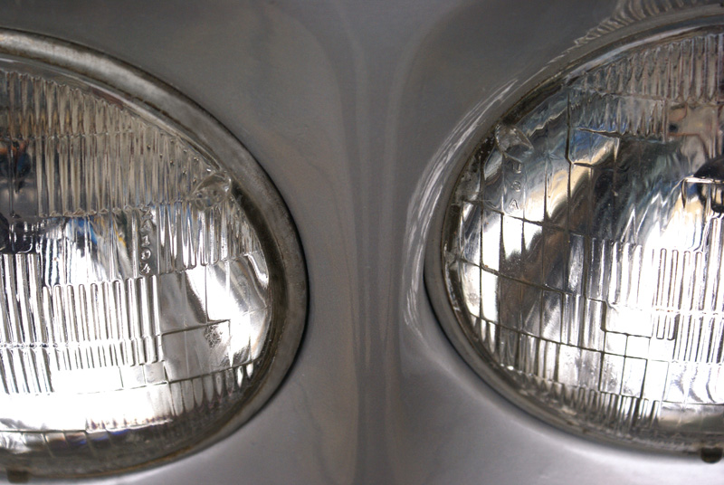 there are two headlights of an old car