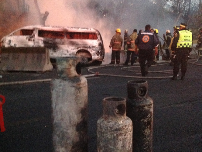 a fire is on near some fire hydrants