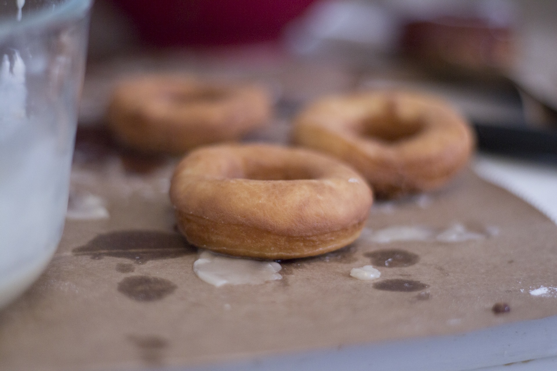 three donuts and a glass of milk