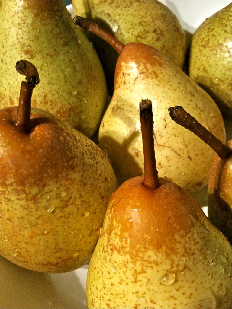 some pears have been stuffed in together on the plate