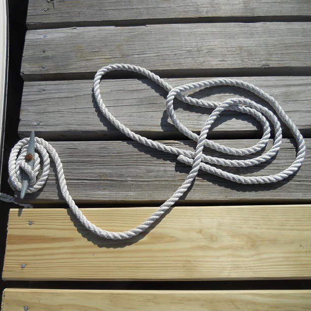 a rope on top of a piece of wood
