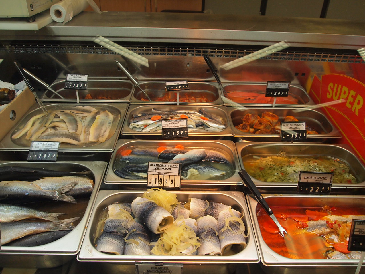 a display case filled with different types of foods
