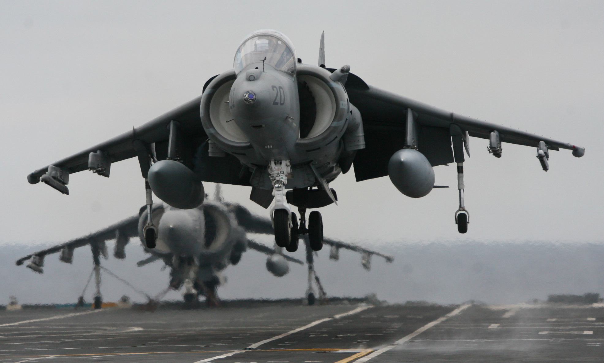 the fighter jet is getting ready to land on the runway