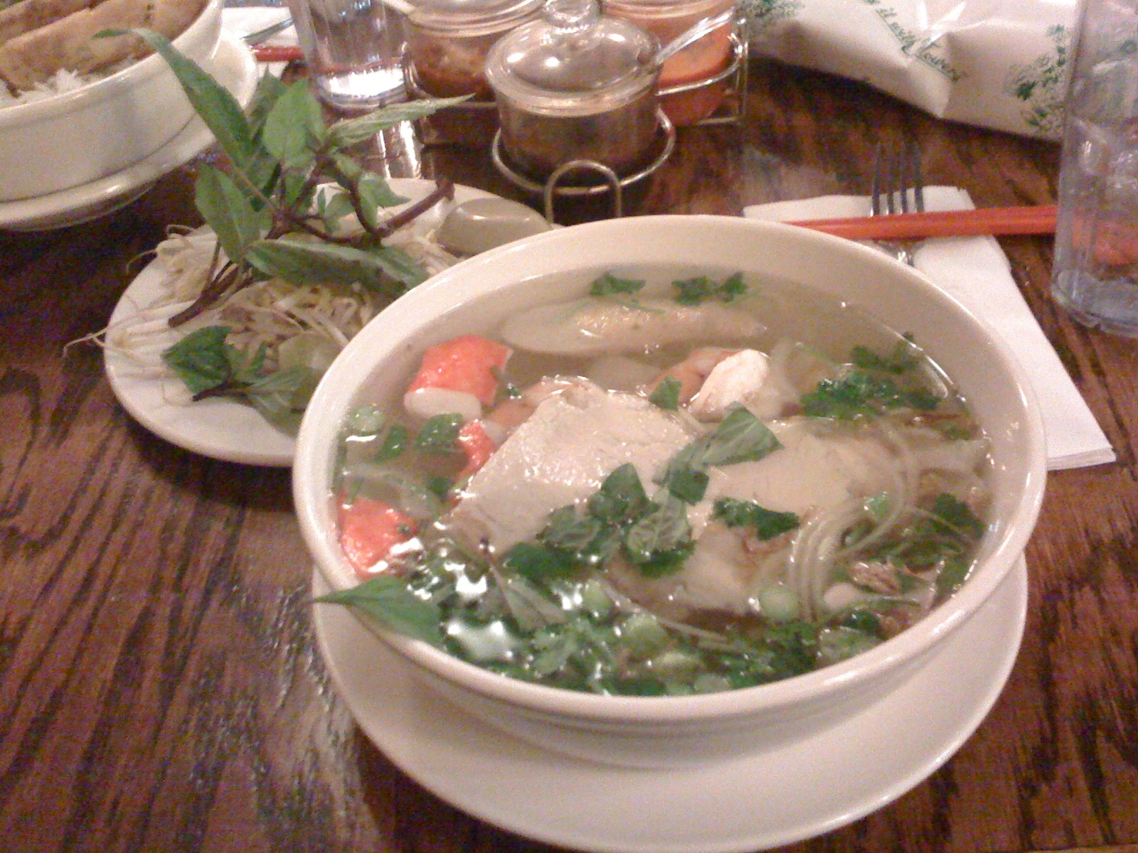 an assortment of soups sit on a table