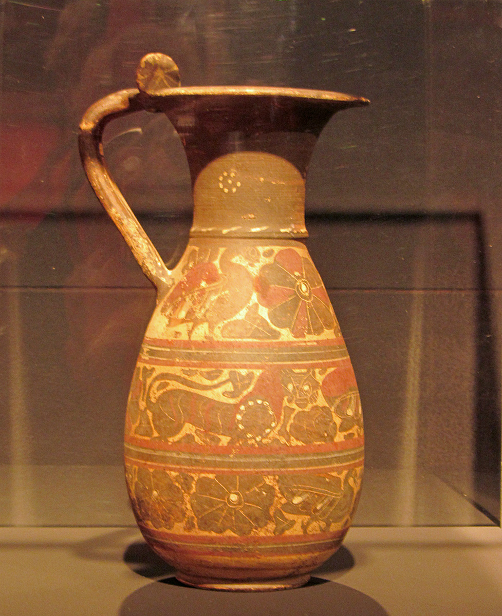 a vase in an exhibit at the museum