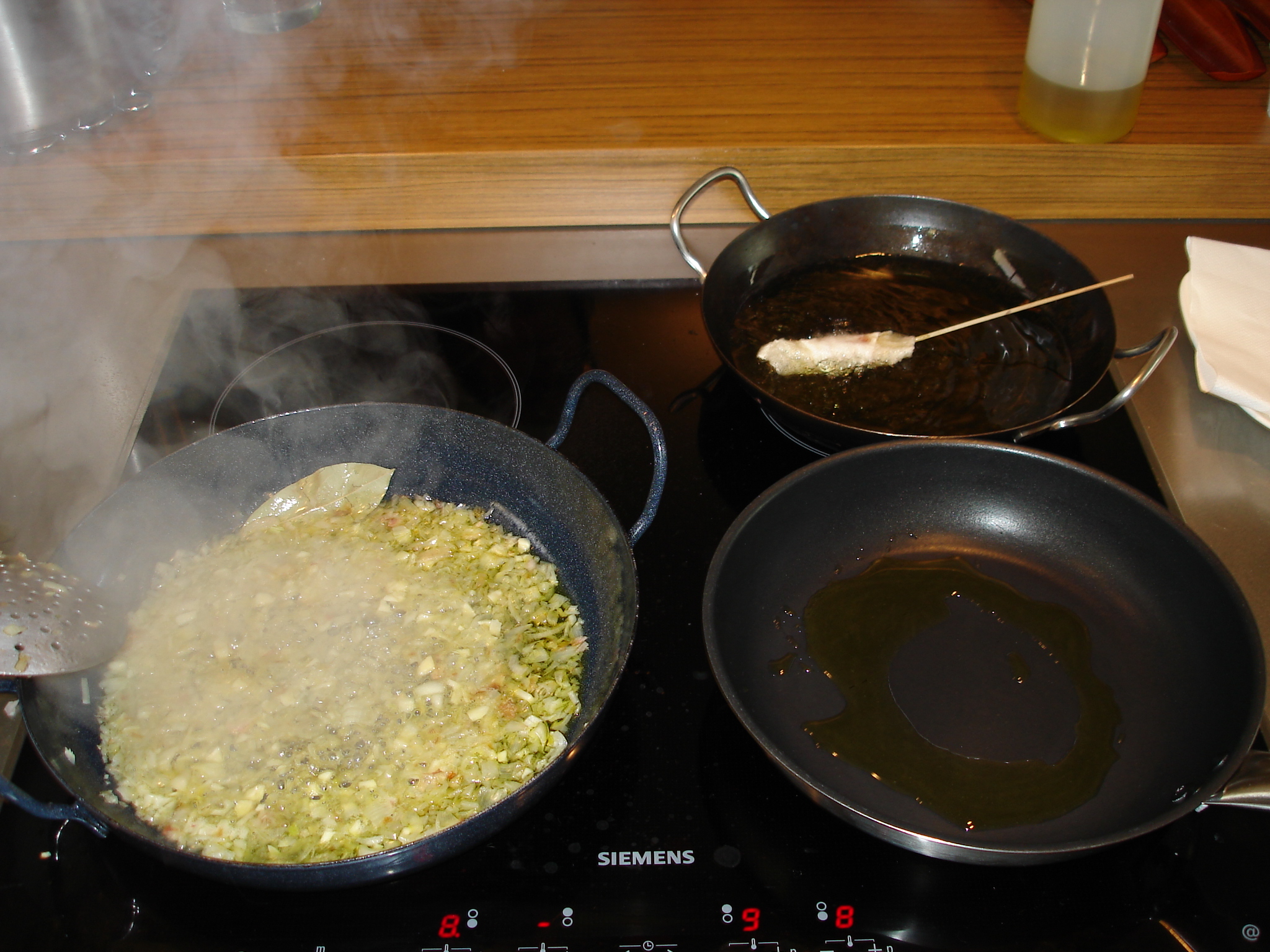 a set and pan are cooking on the stove