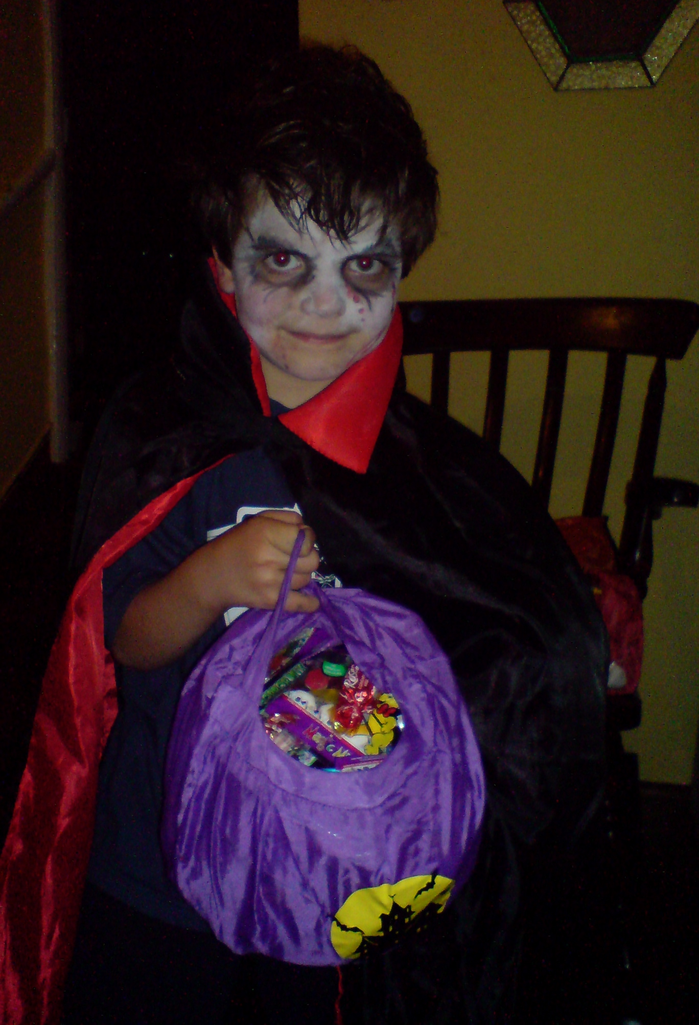 a child dressed as jack and sally on his own