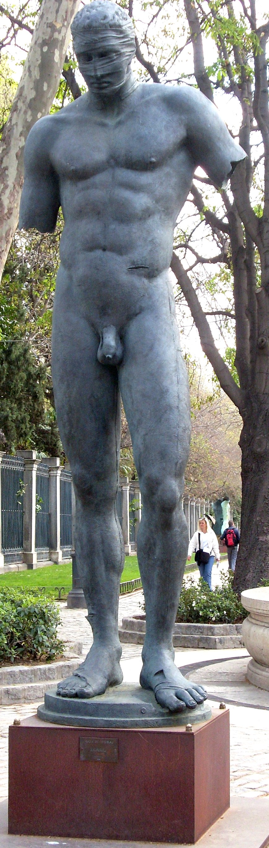 the large statue is dressed in silver