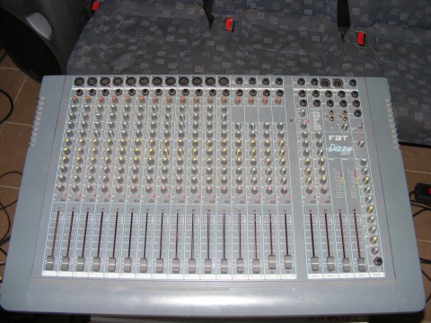 a closeup of a radio mixing console