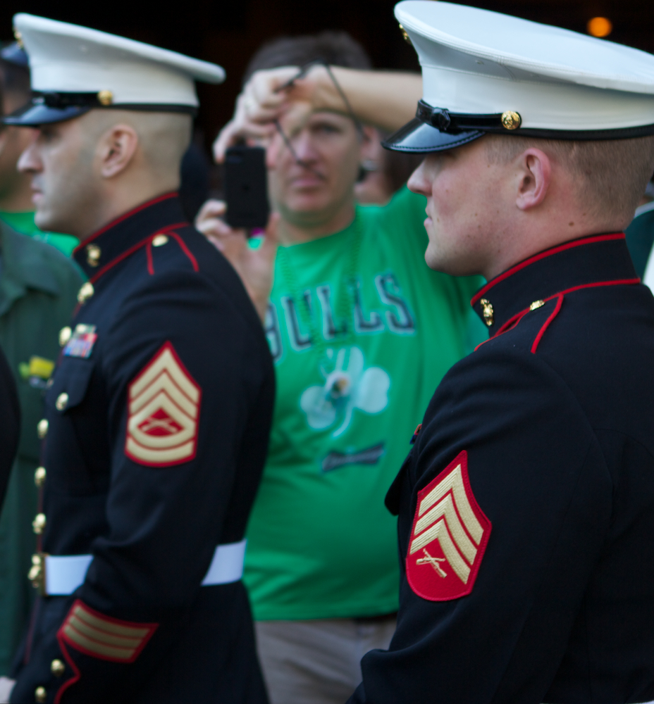 some men in uniform are standing near each other