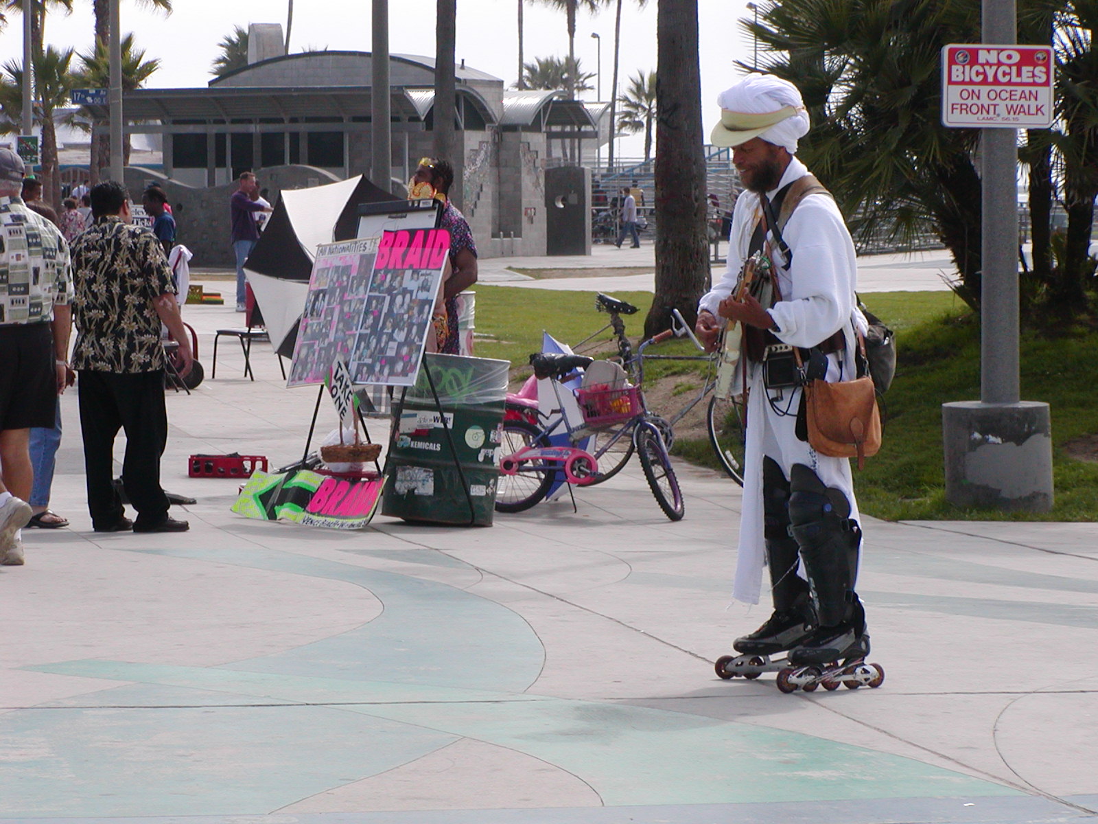 the man is standing on his skateboard