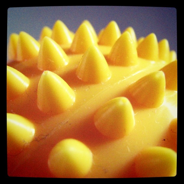 a close up of a cake that looks like spikes