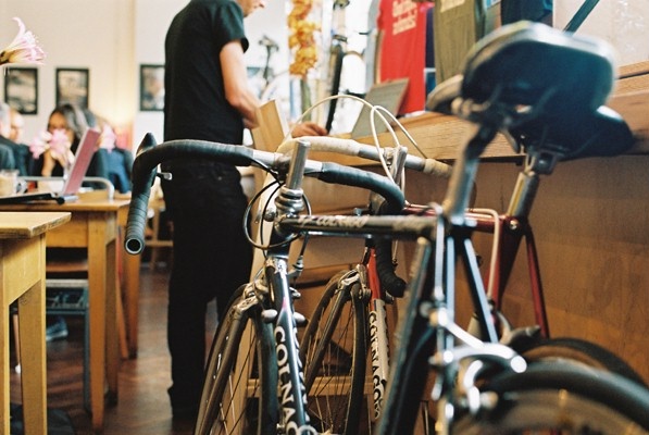 an image of the store with bikes hanging on the wall