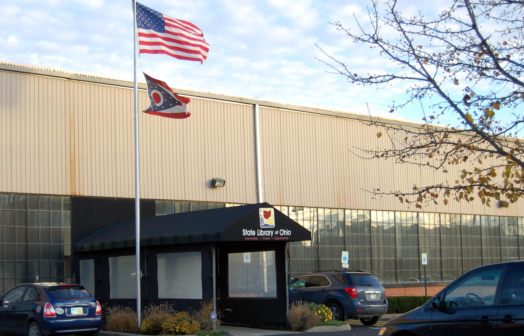 a building with an american flag on top