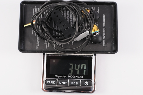 a digital clock sitting on top of an electronic device