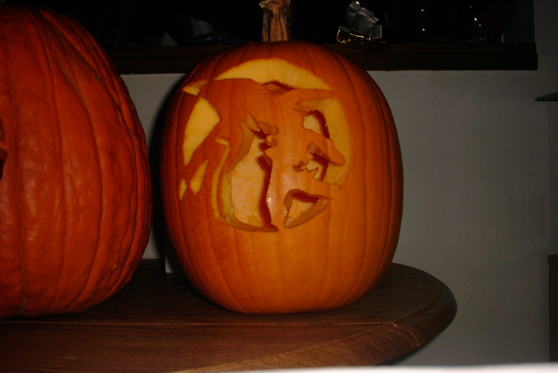 a pumpkin carved to look like a man's face