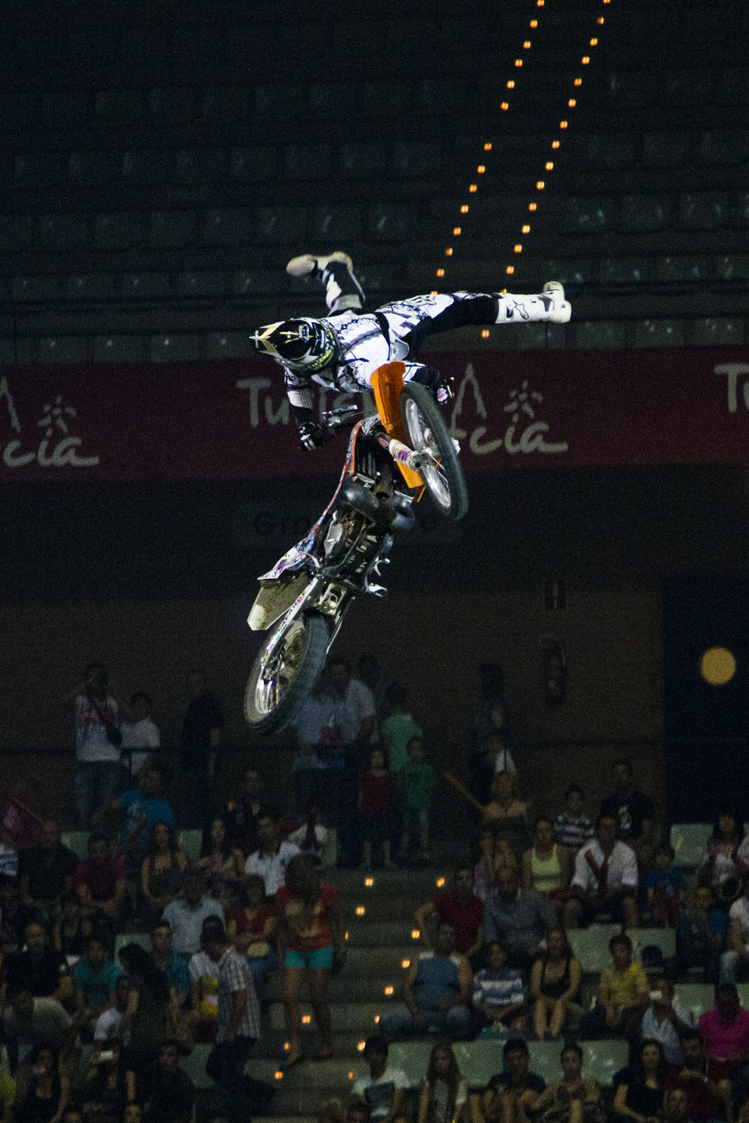 a man is riding a bike at a motorcycle event