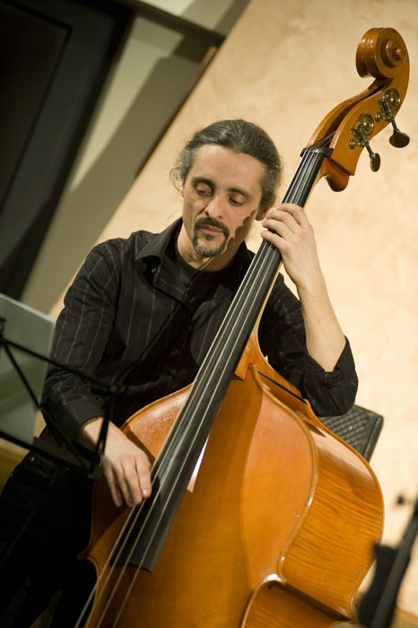 a cellphone cello player with long black hair