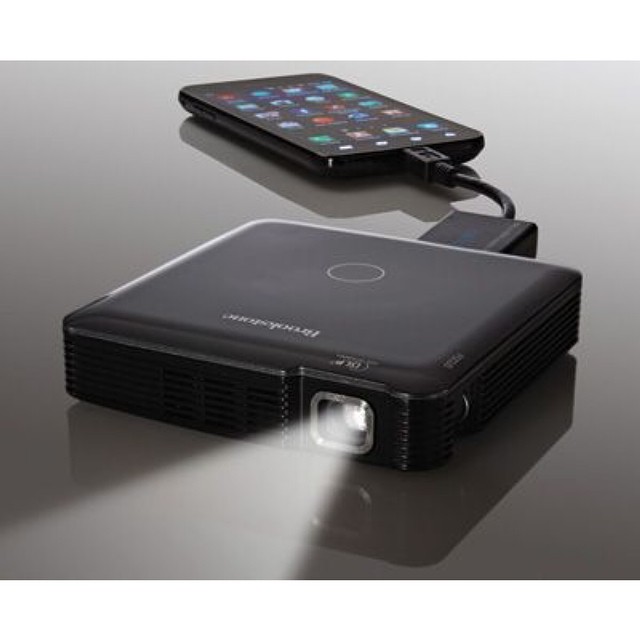 a portable projector with the screen open