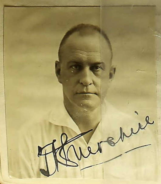 an old po of a man in the uniform of a baseball player