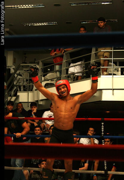 there is a boxer with a red boxing cap in the ring