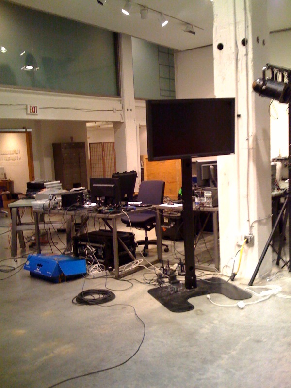 the inside of an office area with some chairs