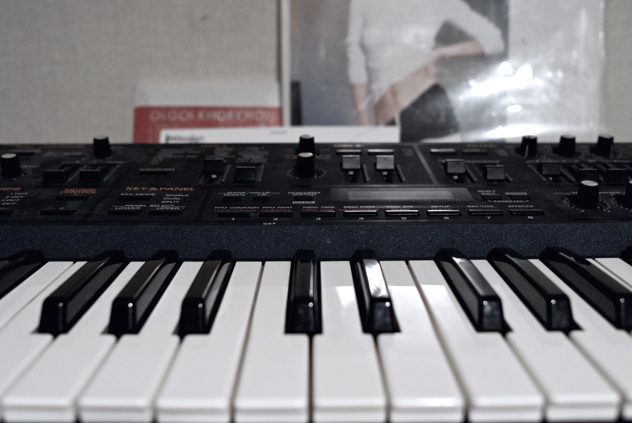 closeup of an electronic keyboard with a blurry background