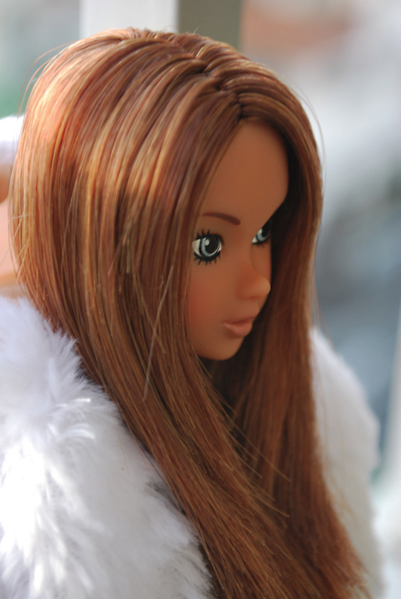 doll hair is in full color with blue eyes