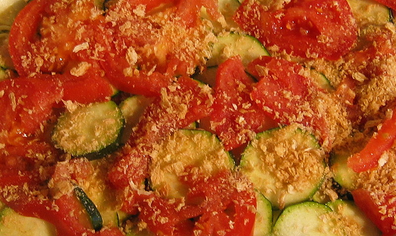 an image of vegetable casserole with red peppers