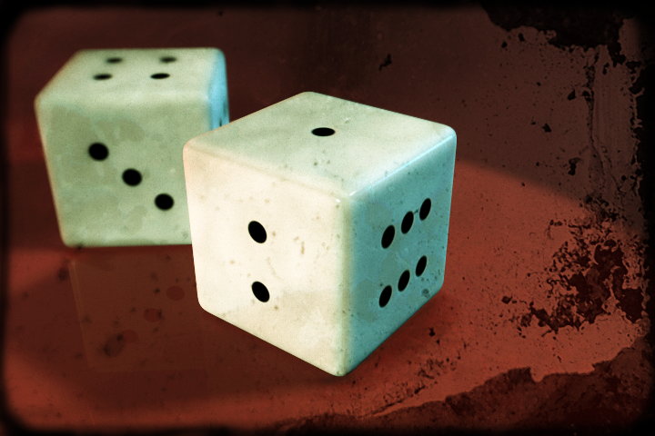 a pair of old fashioned, blue and white dice are placed together