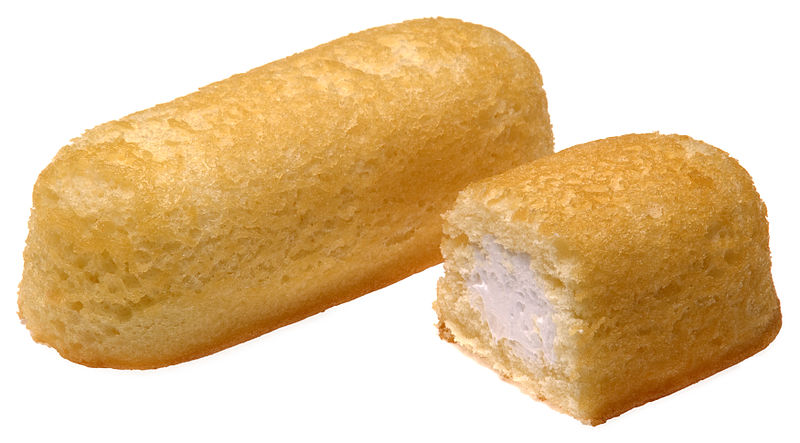 two fried pastries in cut in half