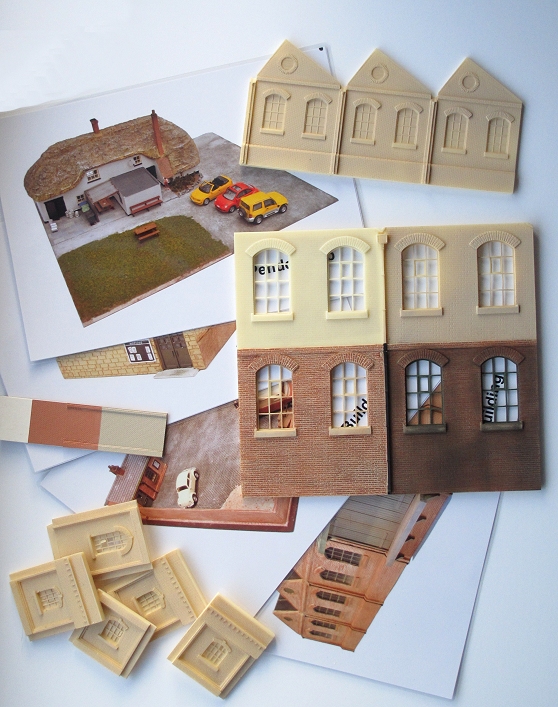 a paper model of a house is shown in multiple blocks