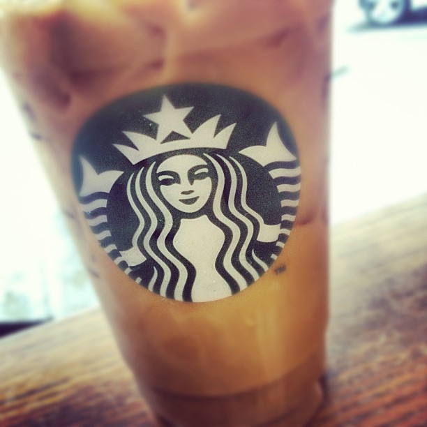 closeup of a starbucks drink on the table