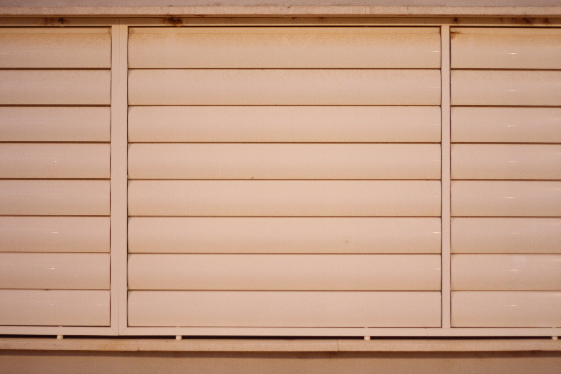 a closeup of shutters on a window