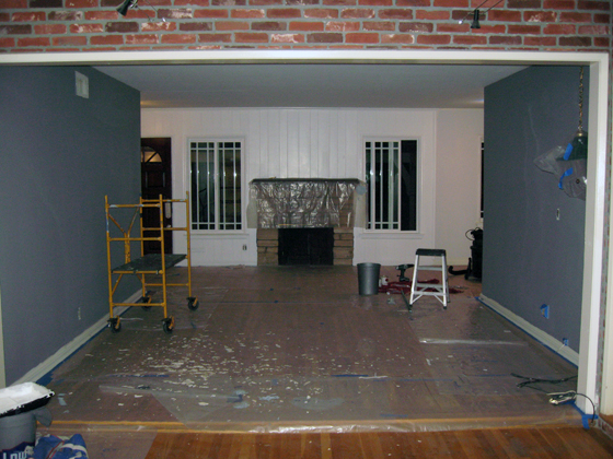 a room being remodeled with grey walls and floors