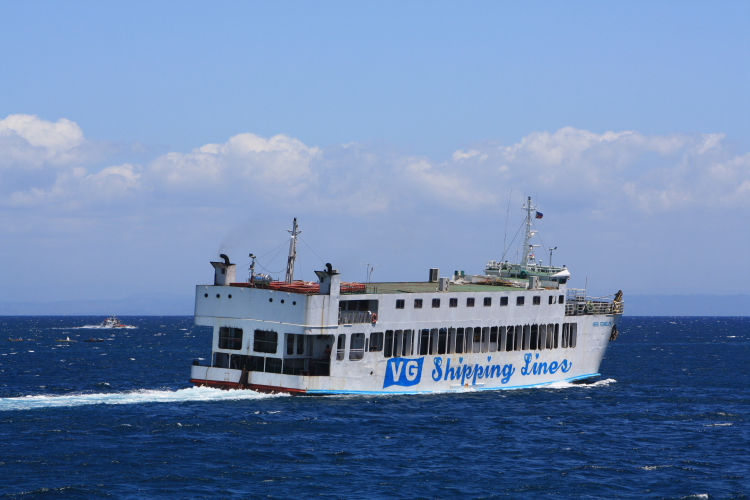 a white ship on top of a blue ocean