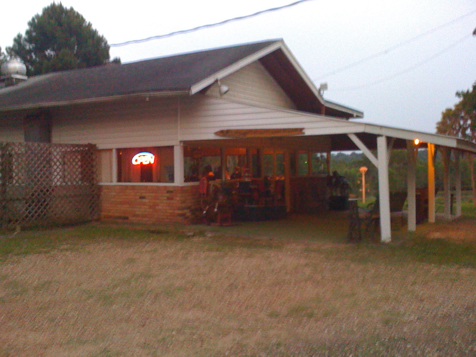 the porch area in this home has a large light on