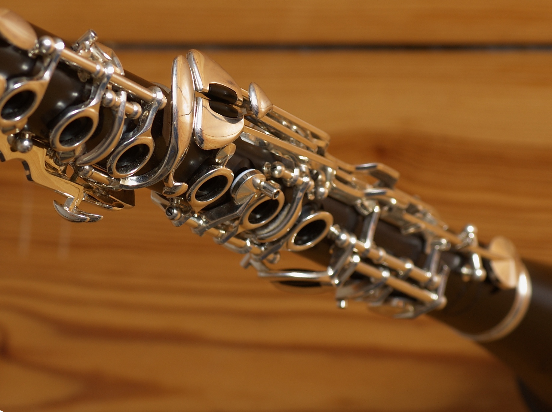 closeup view of a flute with musical instruments on the top