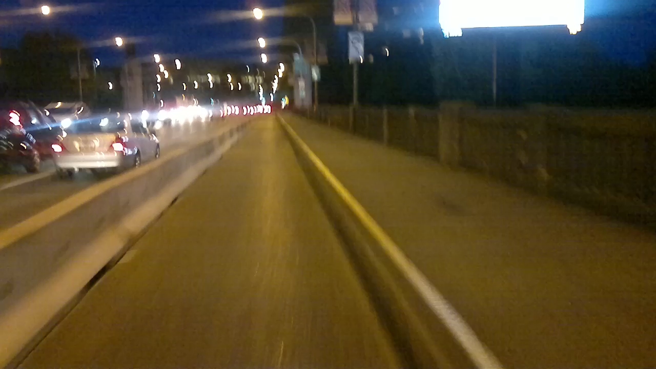 blurry view of a freeway at night