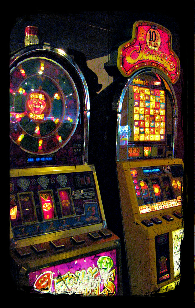 three casino machines in different positions on display