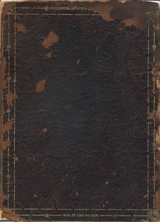a brown leather book with a black cover