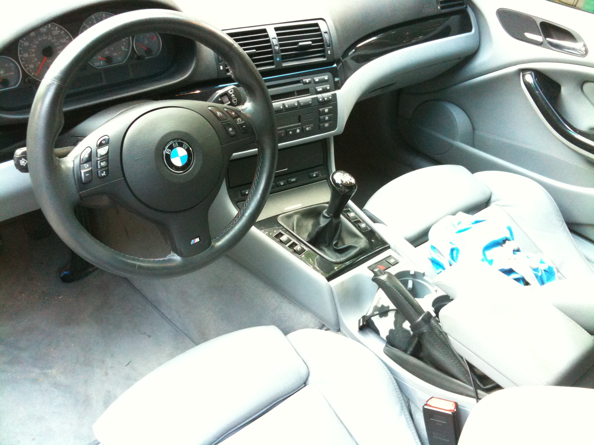 the inside view of a car with some gray seats