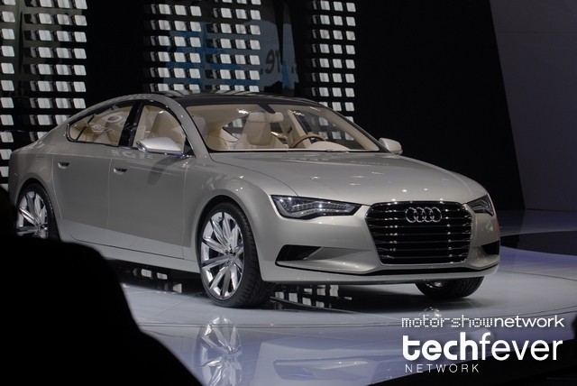an audi at the detroit auto show during the day